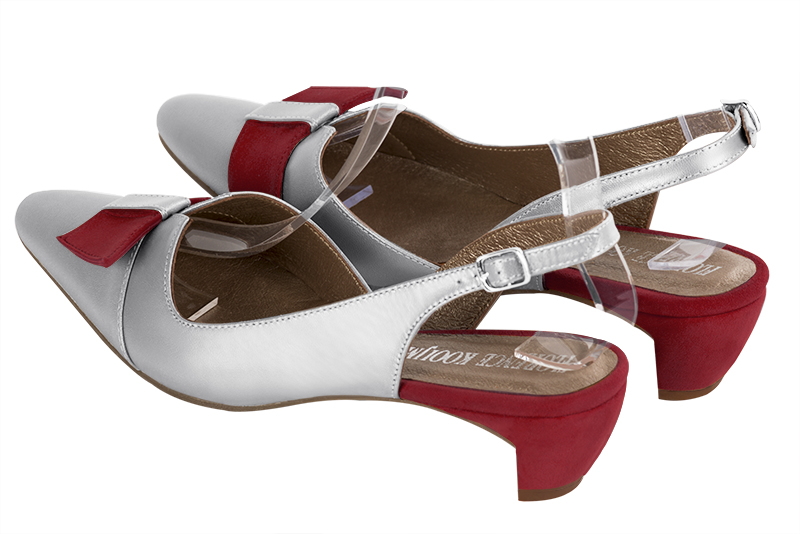 Light silver women's open back shoes, with a knot. Tapered toe. Low comma heels. Rear view - Florence KOOIJMAN